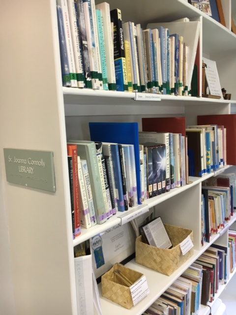 shelves of books at the Sister Joanna Connolly Lending Library